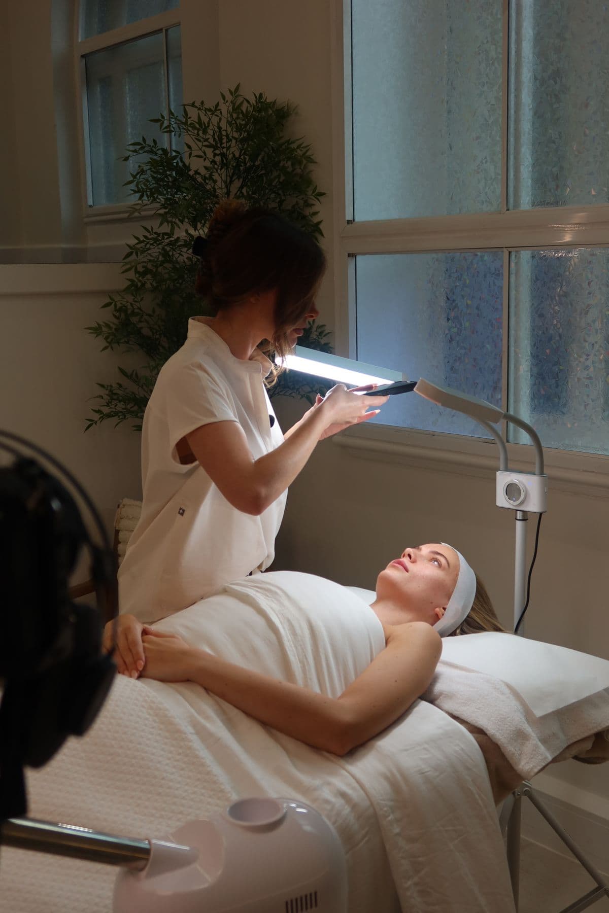A skin assessment under the lamp in MSTA's Rodney Street clinic